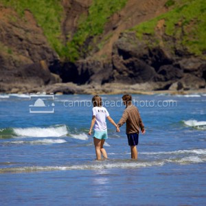 Beach Couple Holding Hands