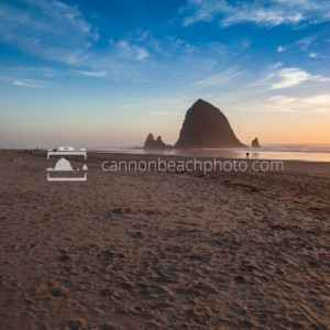 Haystack Rock at Sunset with Sand Foreground