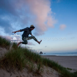 Man Dune Jumping Over Haystack