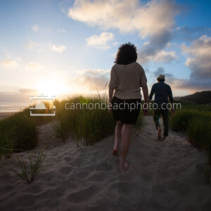 Two People Walking thru the Sunset Dunes
