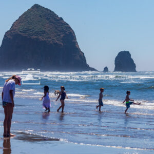 Children Playing on the Shoreline with Haystack Rock 1