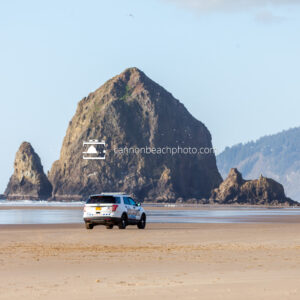 Cannon Beach Police with Haystack Rock