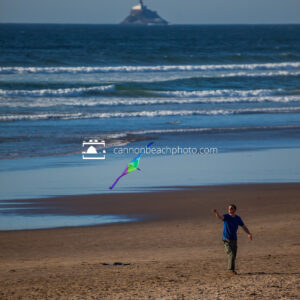 Man Flying a Kite in Cannon Beach