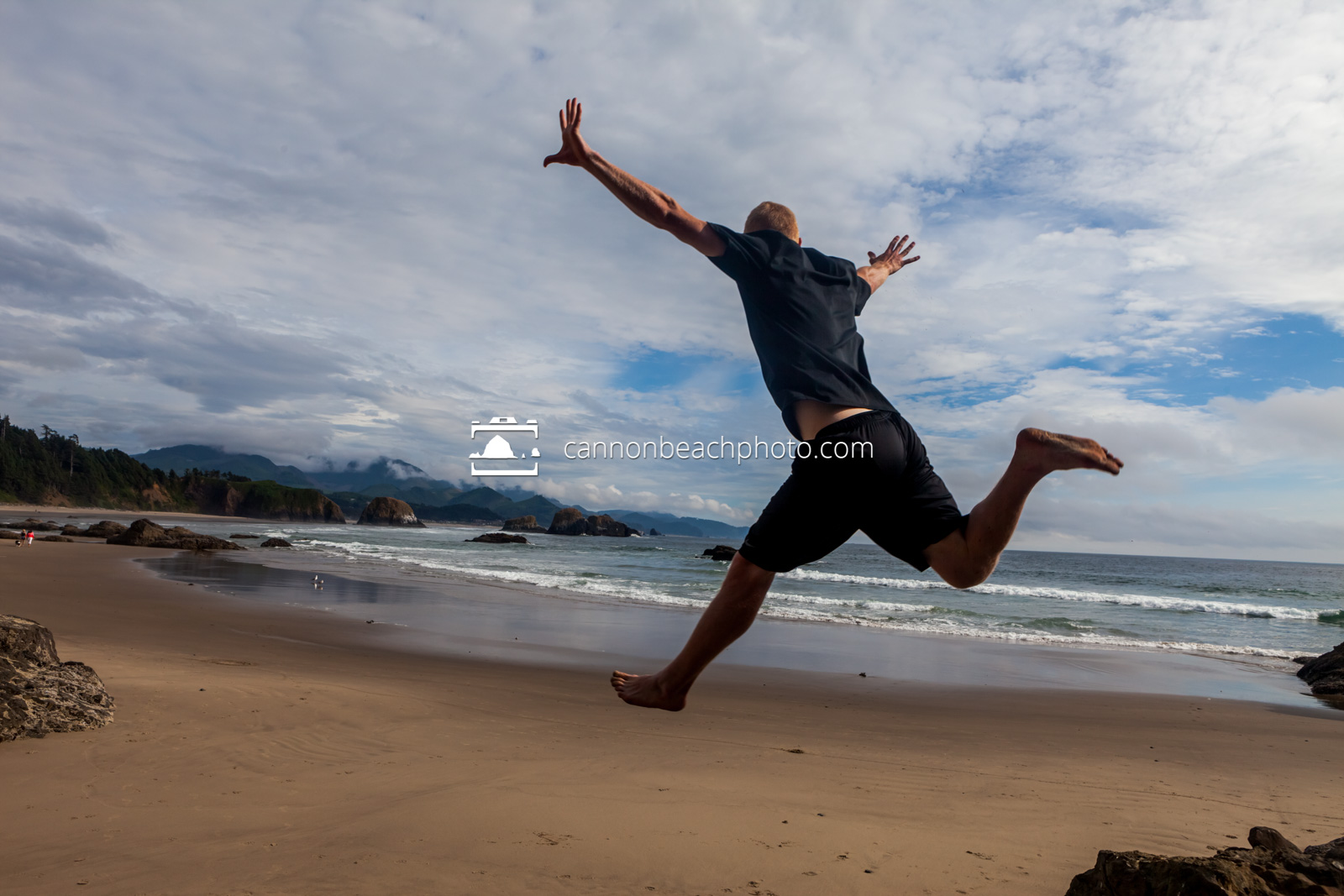 Man Jumping at Crescent Beach, Ecola State Park 1